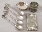 Appraisal: Silver A cased set of four teaspoons with various illustrative