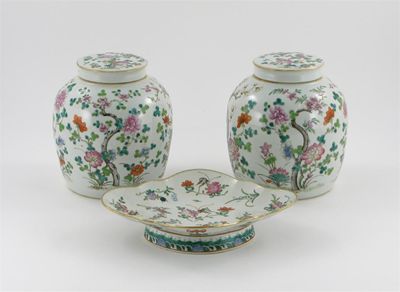 Appraisal: A pair of Chinese famille rose ovoid vases and covers