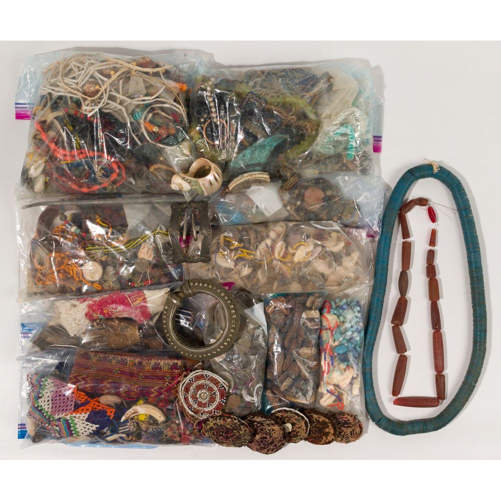 Appraisal: ETHNOGRAPHIC BEAD AND ORNAMENT ASSORTMENTOver pounds of stone shell bone