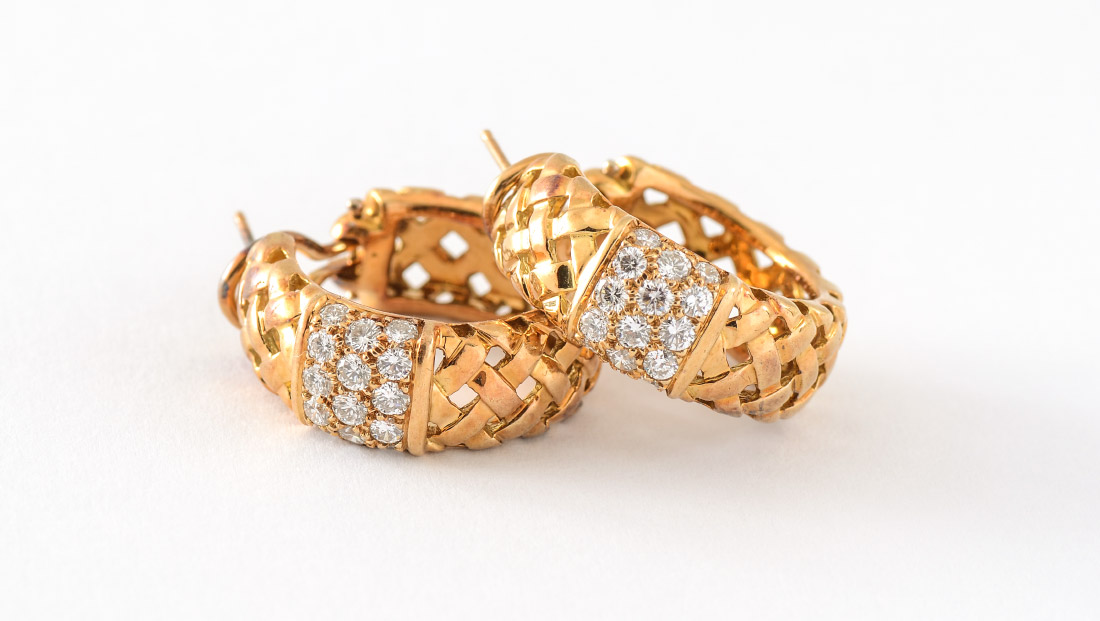 Appraisal: TIFFANY CO GOLD AND DIAMOND EARRINGS Woven strands of K