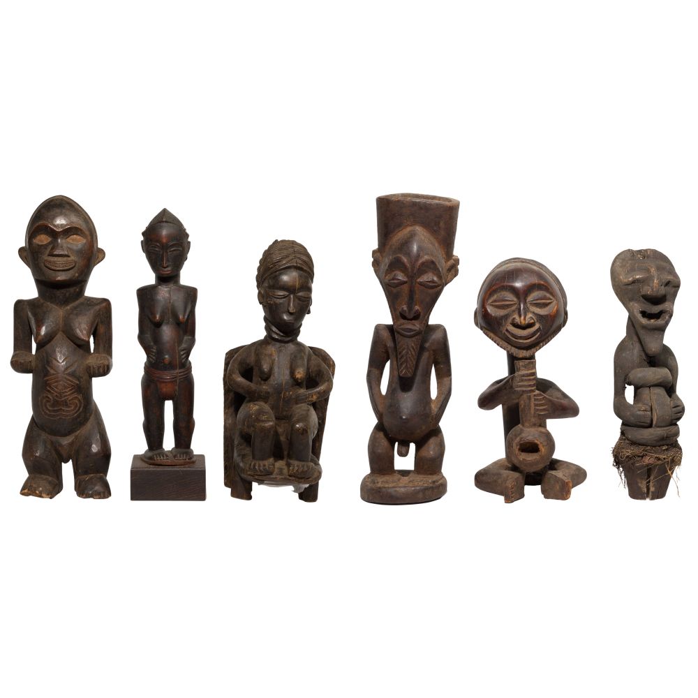 Appraisal: ETHNOGRAPHIC CARVED WOOD FIGURE ASSORTMENT items including a Guro seated