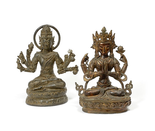 Appraisal: A Sino-Tibetan bronze seated multi-armed deity th Centurythe figure Manjushri