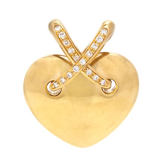 Appraisal: Sale Lot An Karat Yellow Gold and Diamond Heart Pendant