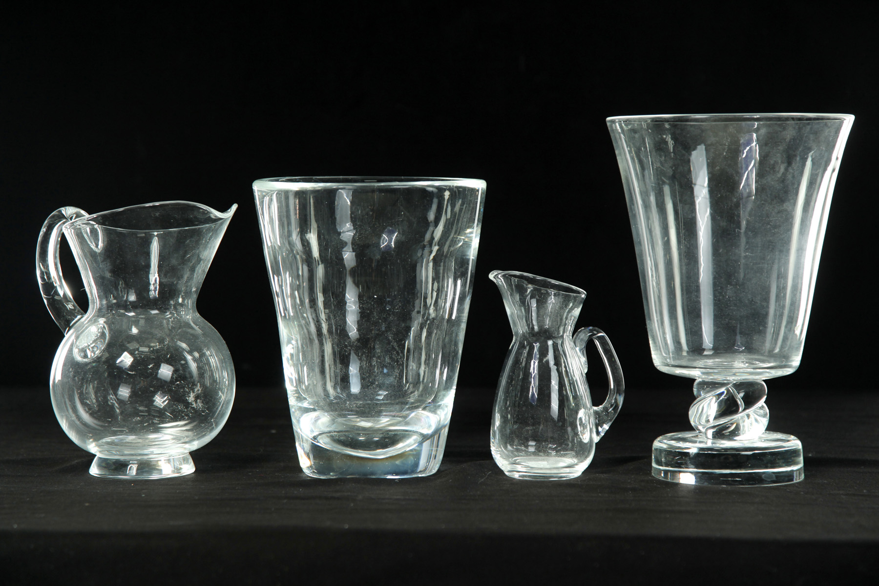 Appraisal: FOUR PIECES OF SIGNED STEUBEN CLEAR GLASS American nd half-