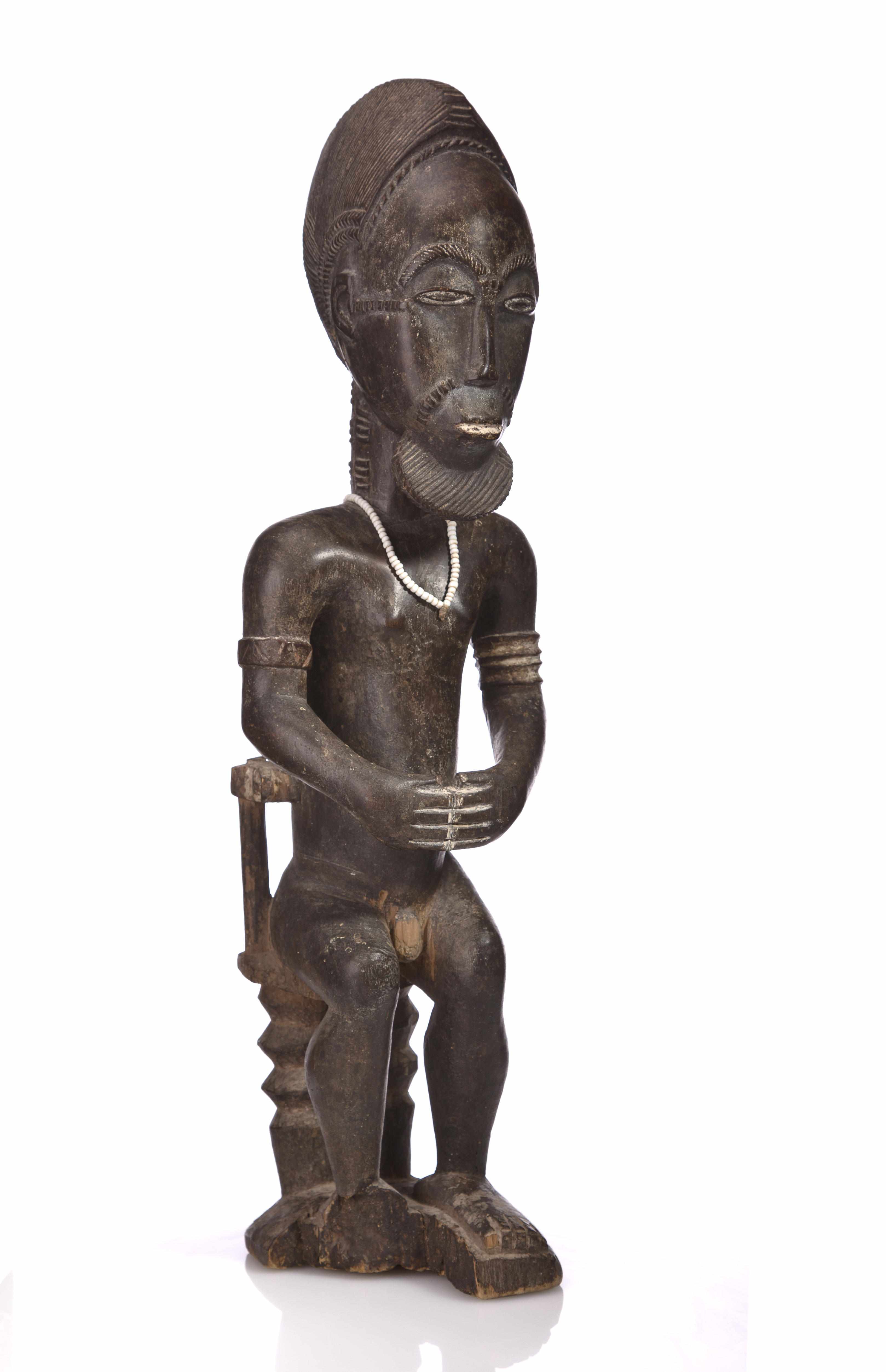 Appraisal: A Baule male seated figure Ivory Coast on throneheight in