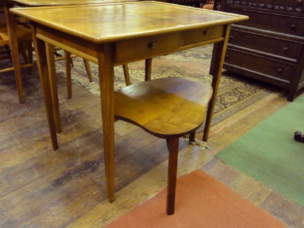 Appraisal: A walnut side table the rectangular well matched quarter veneered