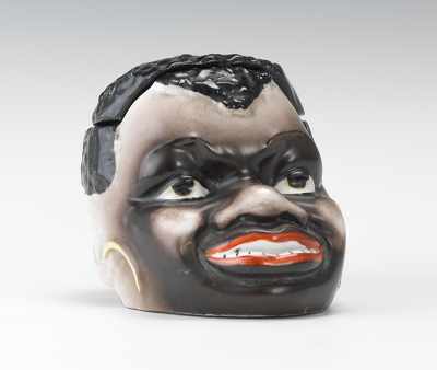 Appraisal: A Porcelain African Character Head Tobacco Jar Stylized head with