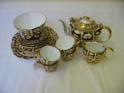 Appraisal: A ROYAL CROWN DERBY PORCELAIN TEA SET comprising four cups