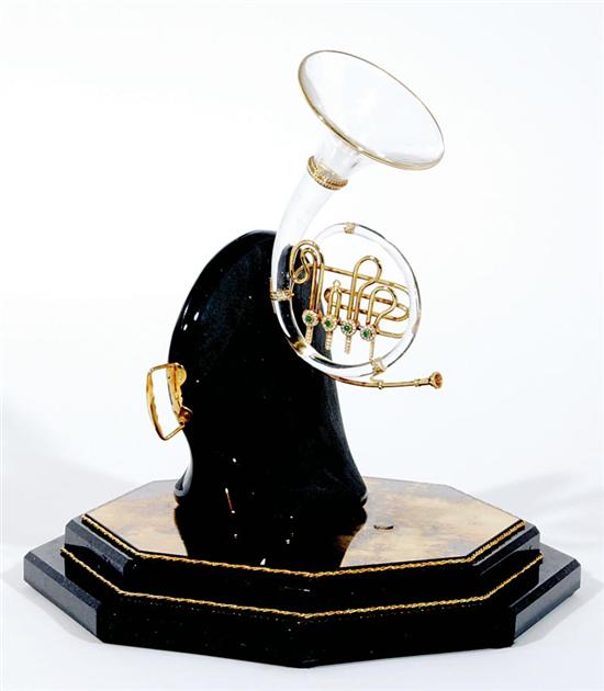 Appraisal: English gemstone and gold-mounted crystal French horn sculpture polished translucent