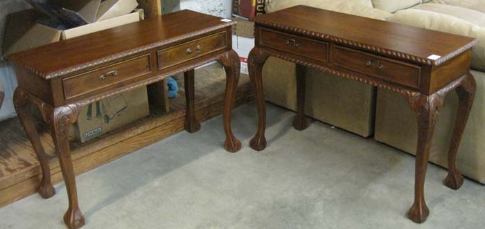 Appraisal: A PAIR OF CHIPPENDALE STYLE MAHOGANY CONSOLE TABLES each having