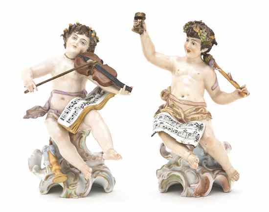 Appraisal: A Pair of Continental Porcelain Bacchic Figures depicting two polychrome