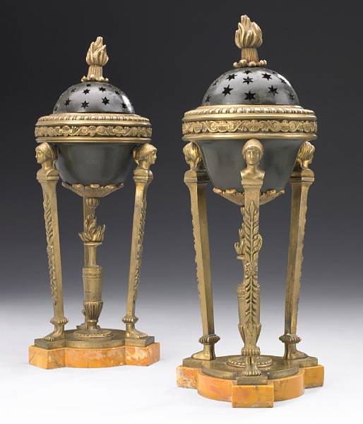 Appraisal: A pair of Empire style bronze and sienna marble cassolettes