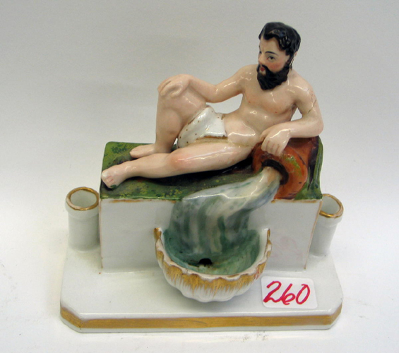 Appraisal: AN ITALIAN CAPODIMONTE PORCELAIN FIGURAL INKWELL of a partially clad