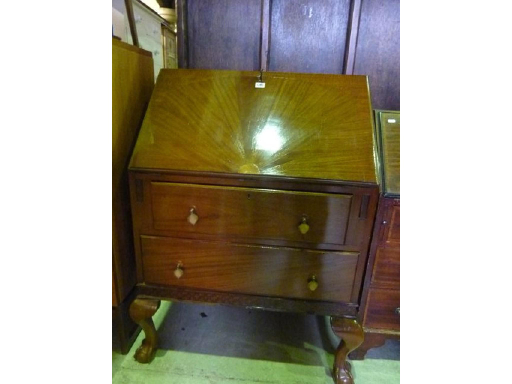 Appraisal: A 's 's mahogany bureau the fall front with decorative