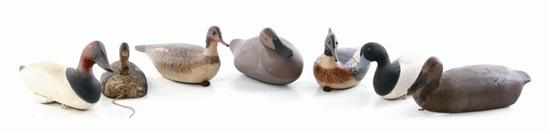 Appraisal: Carved and painted duck decoys unidentified makers early to late