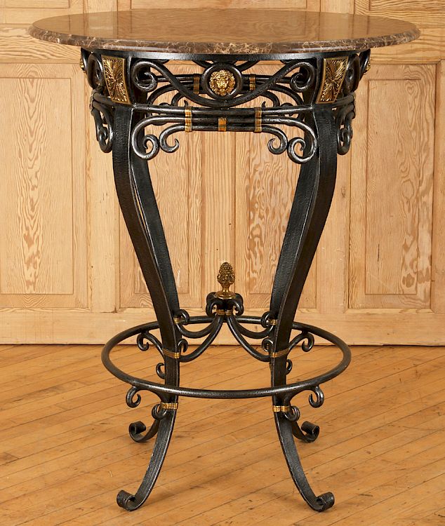 Appraisal: IRON BRONZE DECORATED MARBLE TOP BISTRO TABLE An iron and