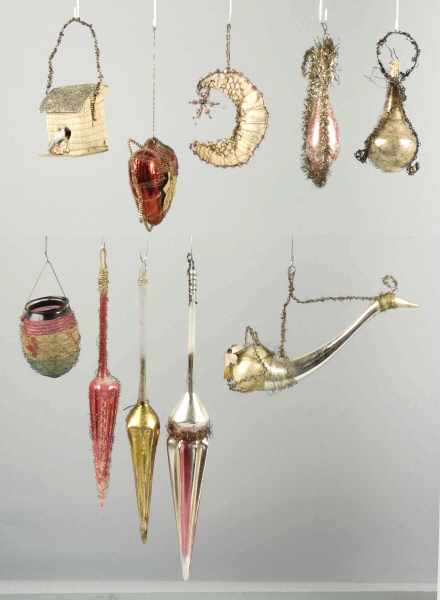 Appraisal: Lot of Wire Wrapped Ornaments Description Includes three umbrellas duck