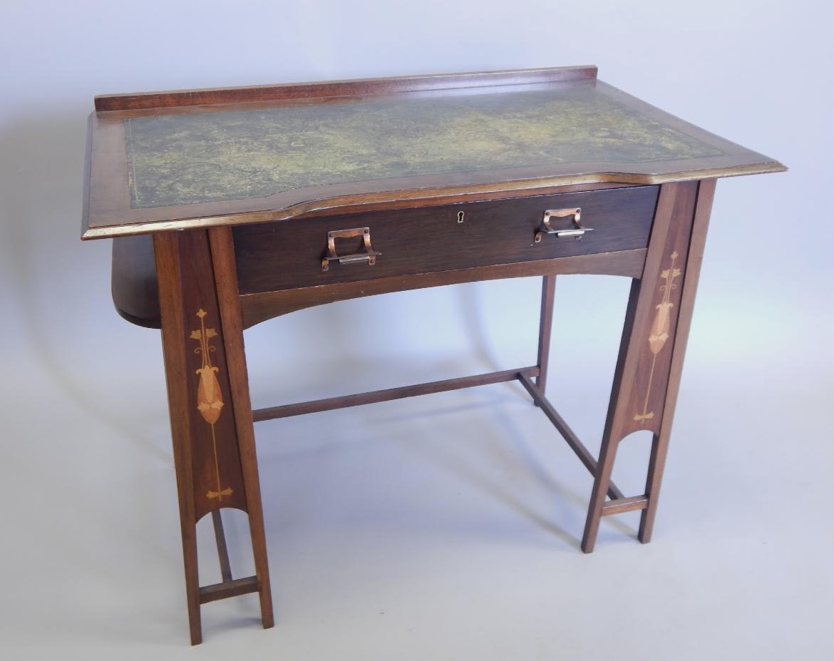 Appraisal: A th-early thC Art Nouveau style mahogany writing table the