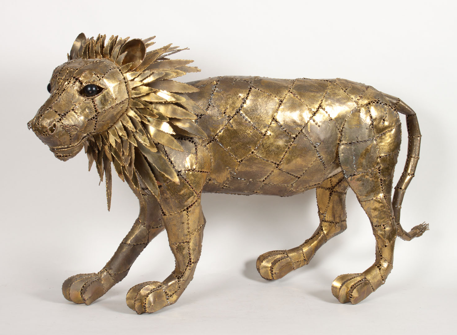 Appraisal: L Bustamante Lion brass sculpture Luciano Bustamante Italian Contemporary Sheet