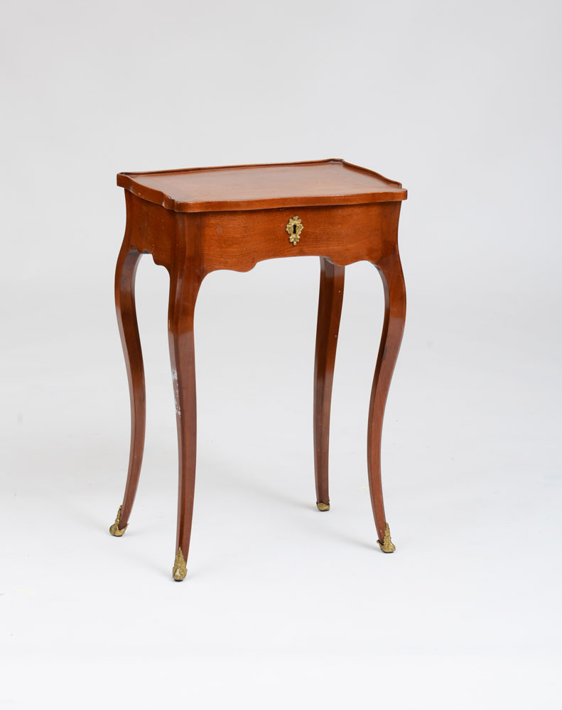 Appraisal: LOUIS XV ORMOLU-MOUNTED MAHOGANY SMALL TABLE CRIRE With a hinged