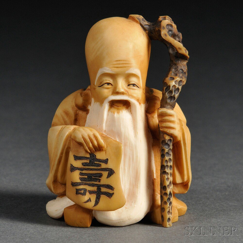 Appraisal: Ivory Netsuke of Juro Japan th century holding a staff