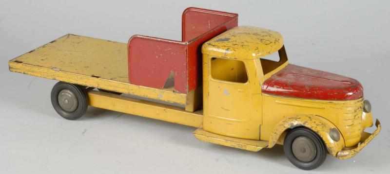 Appraisal: Lot of Pressed Steel Structo Truck Toys Description Circa to