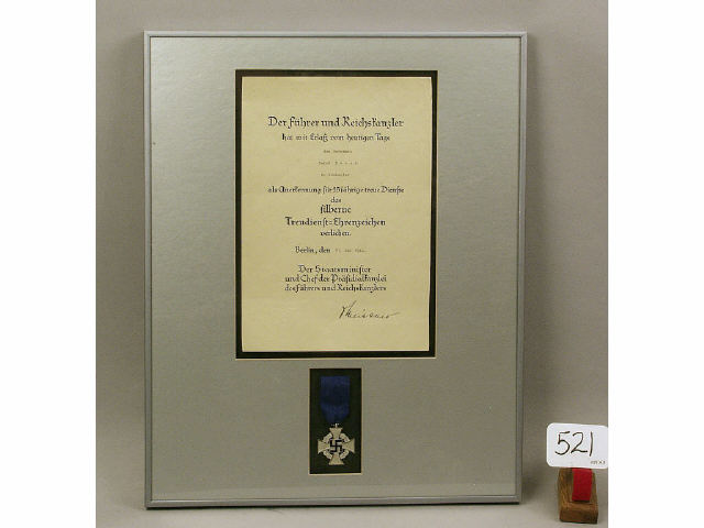 Appraisal: German WWII medal with certificate framed and matted presented to