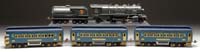 Appraisal: LIONEL O GAUGE STEAM LOCO TENDER -E AND THREE PASSENGER