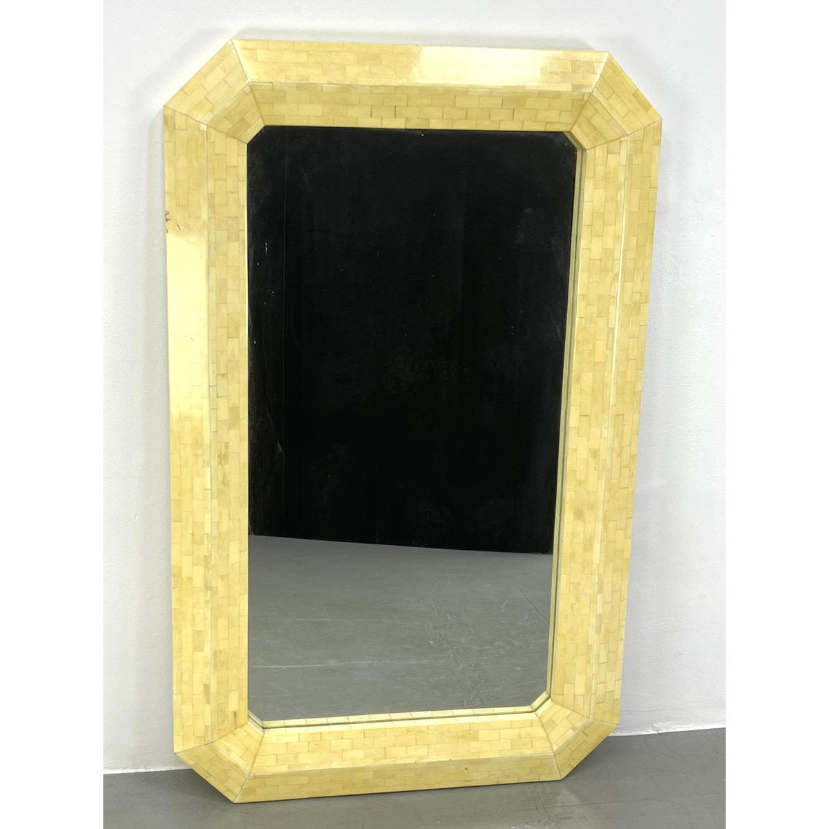 Appraisal: Tesselated Bone Tile Modernist Wall Mirror Notched corners Dimensions H