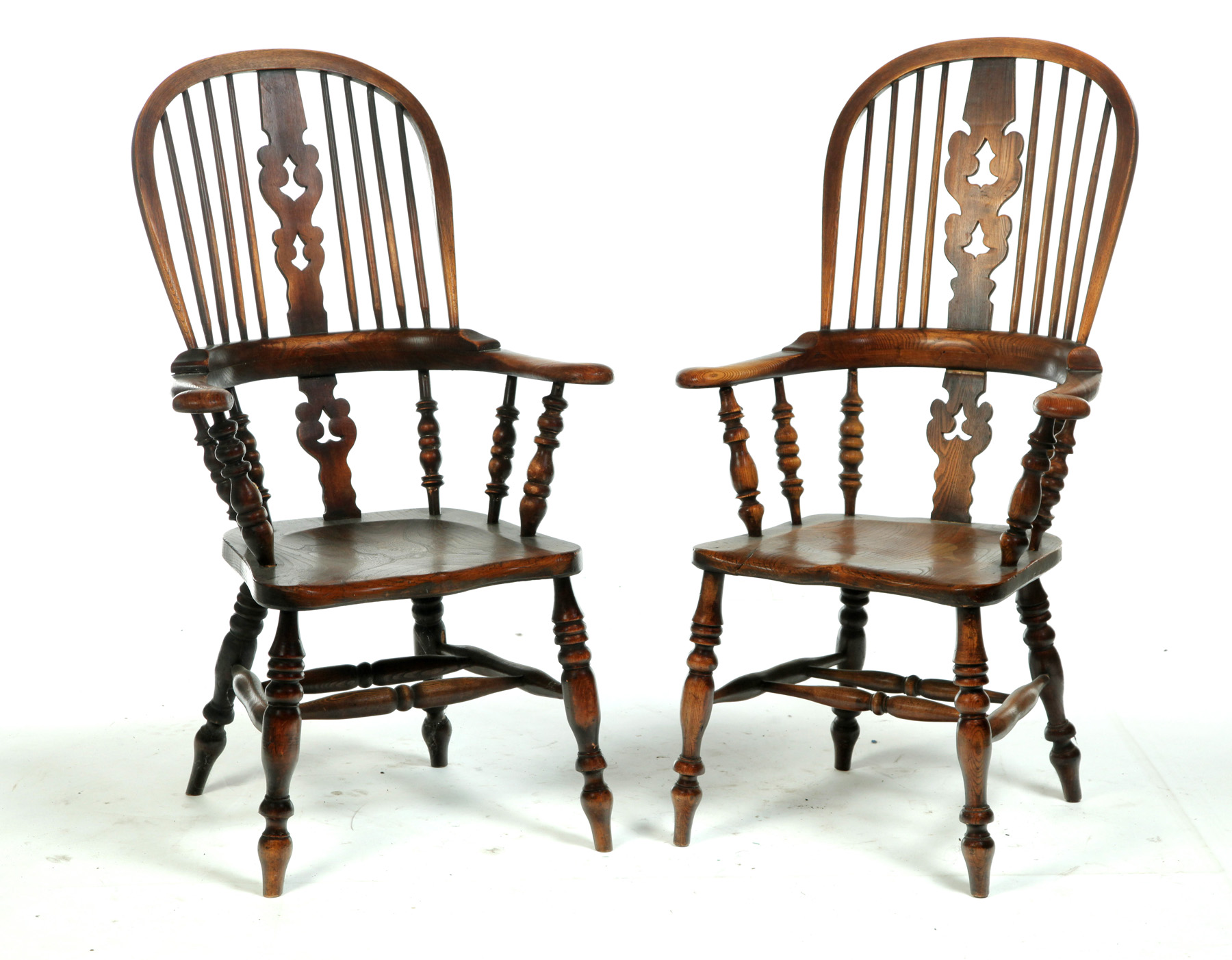 Appraisal: ASSEMBLED SET OF ENGLISH WINDSOR ARMCHAIRS Nineteenth century oak Scrollcut