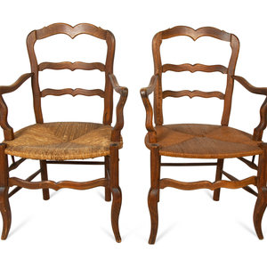 Appraisal: A Set of Four French Provincial Style Walnut Dining Chairs