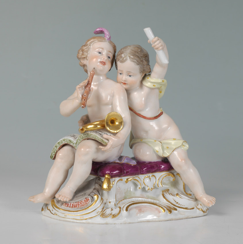 Appraisal: MEISSEN FIGURAL GROUP OF PUTTI Figures of seated putti one