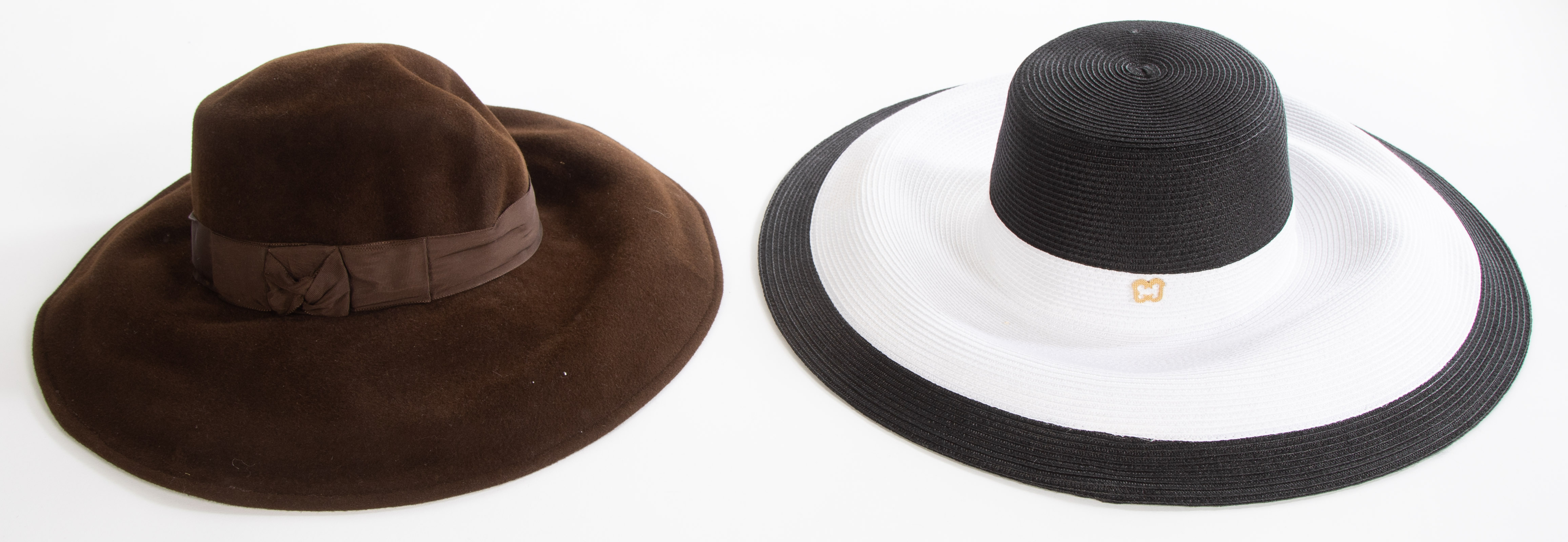 Appraisal: TWO ERIC JAVITS HATS One black and white straw woven