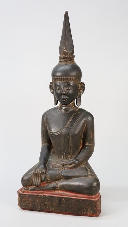 Appraisal: Seated Balinese wood carved Buddha Lacquered with incised symbols around