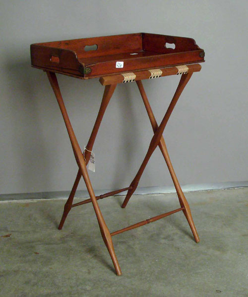 Appraisal: English mahogany tea tray with folding stand