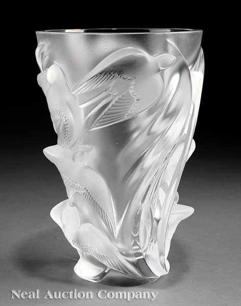 Appraisal: A Lalique Frosted Glass Swifts Pattern Vase flared form molded