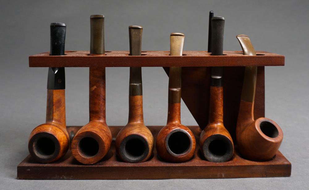 Appraisal: Carved Wood Pipes and Stand