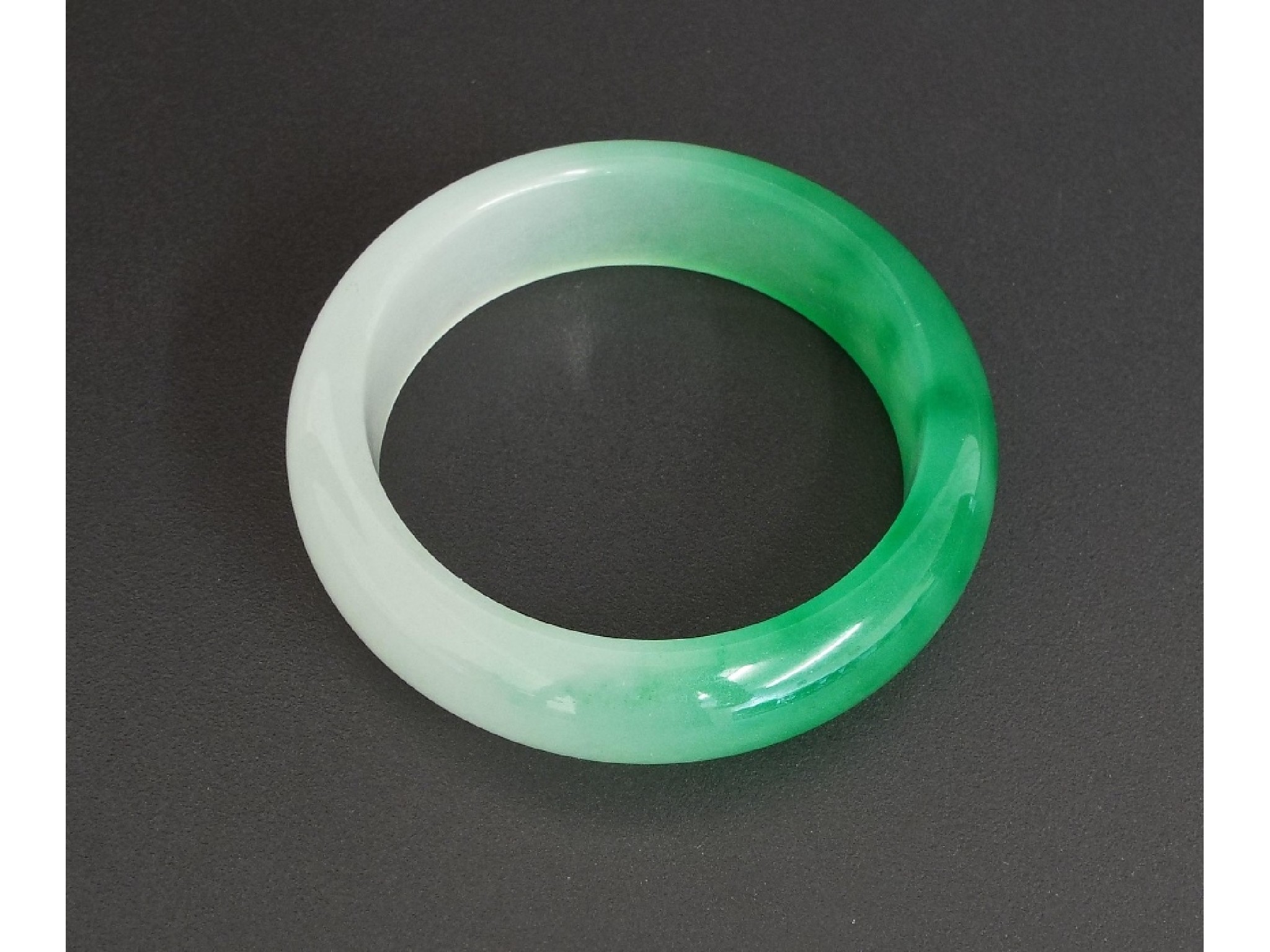 Appraisal: Hardstone bangle gm diameter