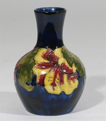 Appraisal: Hibiscus' a Moorcroft Pottery vase designed by Walter Moorcroft painted