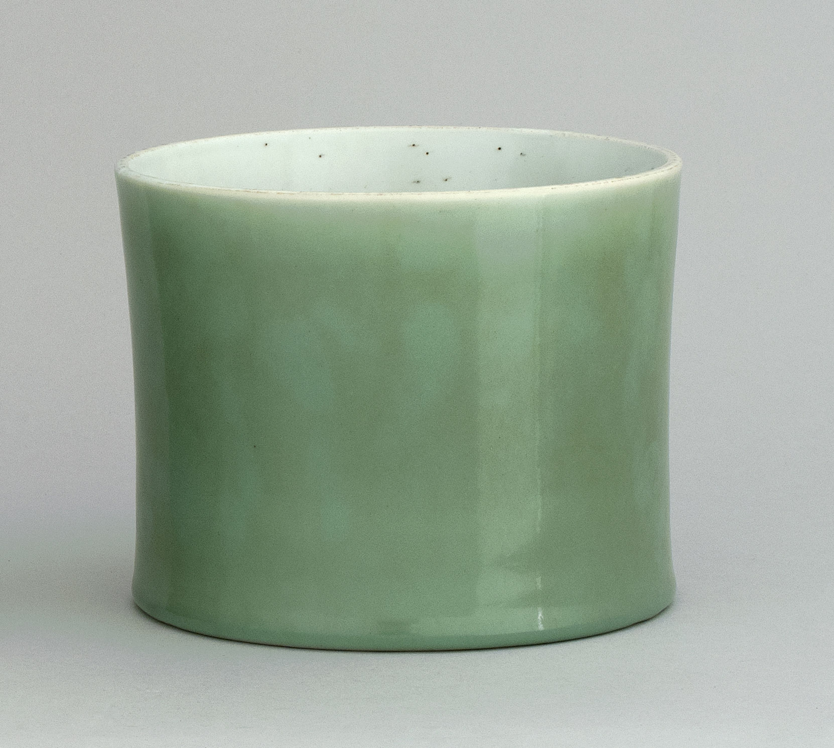 Appraisal: CELADON PORCELAIN BRUSH POT Circa In cylinder form with six-character