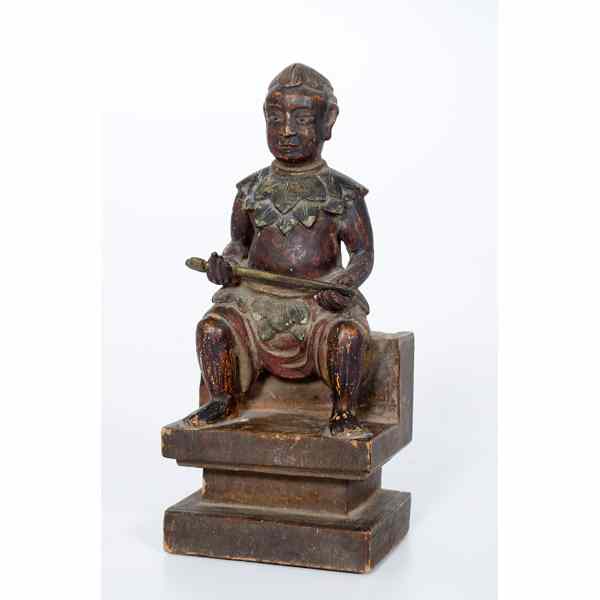 Appraisal: Wooden Seated Chief A carved wooden statue depicting a polychrome