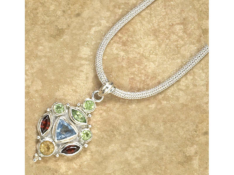 Appraisal: GEMSTONE SUITE Sterling pendant with bezel set gems with rolled