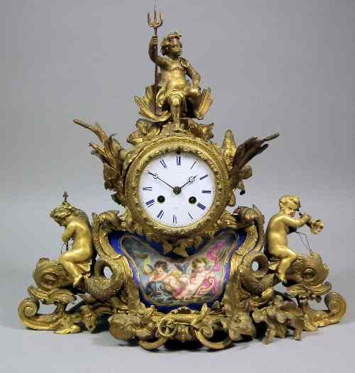 Appraisal: A th Century French gilt brass cased mantel clock retailed