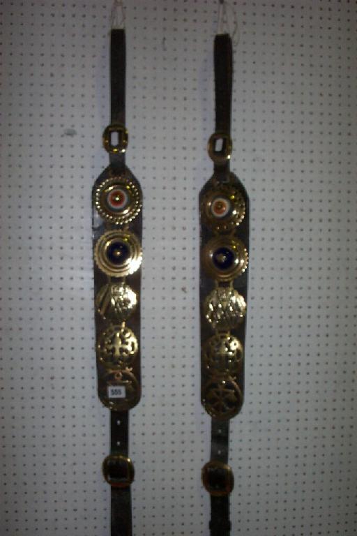 Appraisal: A pair of early th century leather Martingales each fitted