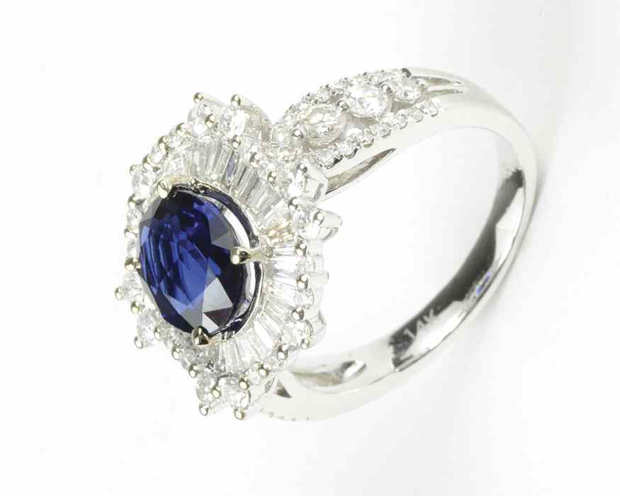 Appraisal: SAPPHIRE DIAMOND AND FOURTEEN KARAT GOLD RING The white gold