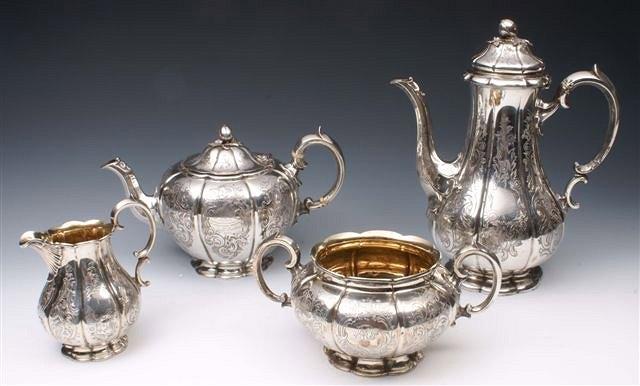 Appraisal: A VICTORIAN SILVER FOUR PIECE TEA SET each piece with