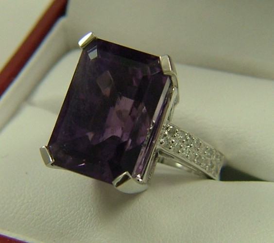 Appraisal: AMETHYST AND DIAMOND RING WITH APPRAISAL K white gold and