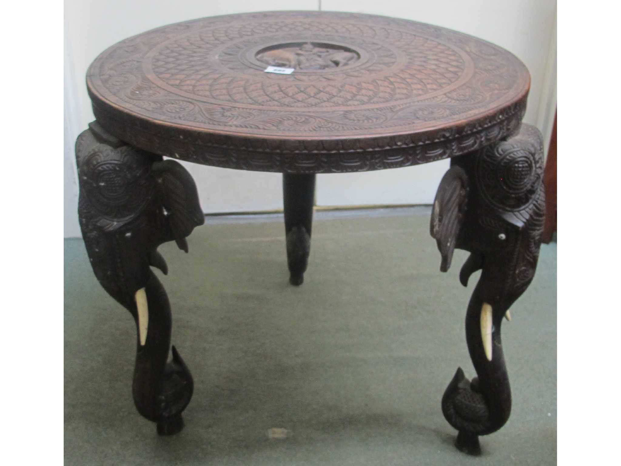 Appraisal: A carved Indian elephant table