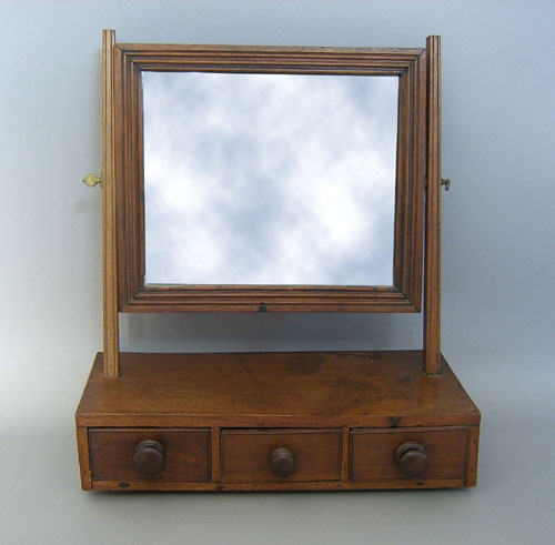 Appraisal: Mahogany shaving mirror th c h w