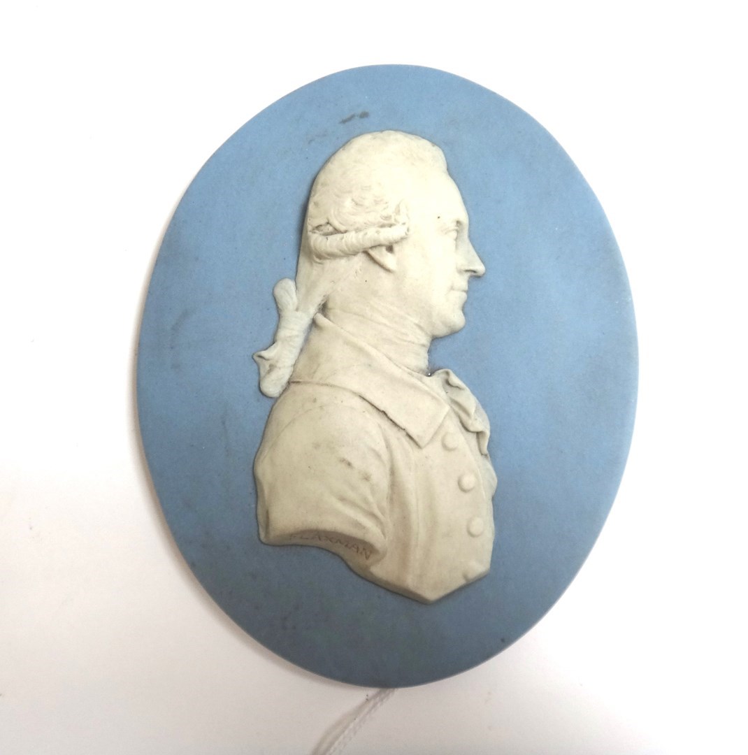 Appraisal: An oval Wedgwood blue jasper portrait medallion by Flaxman depicting